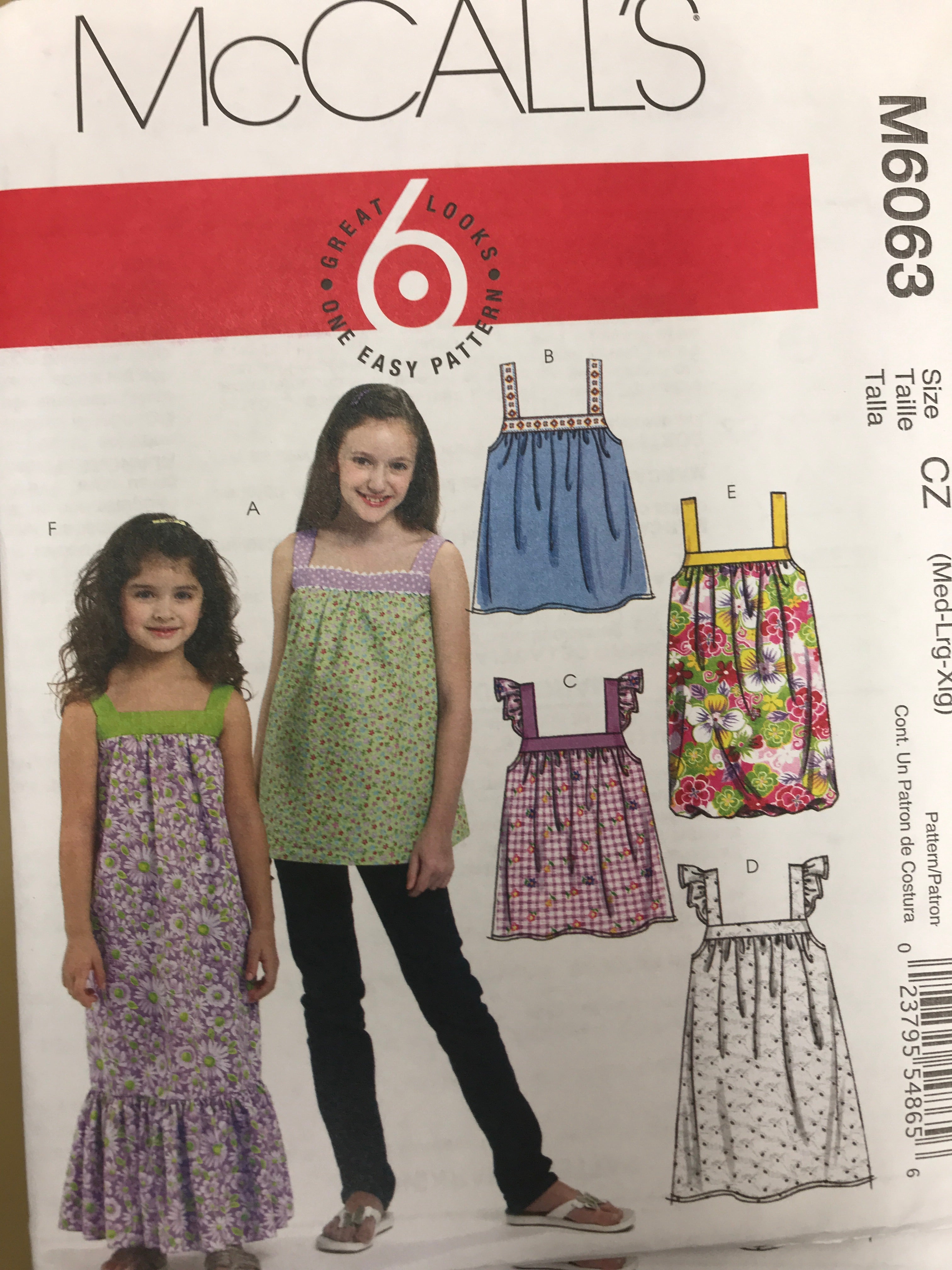 Uncut mccalls sewing Patterns 9511 child's and girls nine size in one size  3-14 FF